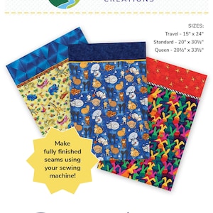 May include: Three different fabric panels for a pillowcase. The panels feature colorful animal prints. The panels are labeled "Travel - 15" x 24", "Standard - 20" x 30 1/2", and "Queen - 20 1/2" x 33 1/2". The text "Roll Me Up Pillowcase" is written in a decorative font.