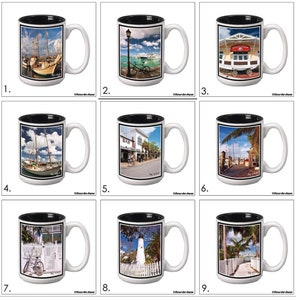 May include: Set of nine white ceramic mugs with black rims. Each mug features a different photograph of a scene from Key West, Florida. The photos include a sailboat, a street lamp, a restaurant, a lighthouse, and palm trees.