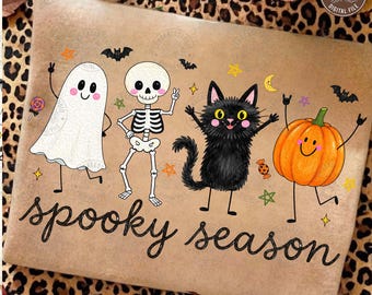 May include: A rectangular print on a tan background featuring a white ghost, a skeleton, a fluffy black cat, and an orange pumpkin with limbs. The characters are surrounded by small stars, bats, and candy. The text spooky season is written below.
