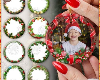 May include: Christmas ornament with a photo of a child wearing a Santa hat, surrounded by a wreath with red ribbon and ornaments. Additional ornaments with festive greenery and decorations are also shown.