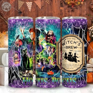 May include: Three purple and black insulated tumblers with a Halloween theme. The tumblers feature images of witches, a black cat, and the text "Hocus Pocus" and "Witch's Brew". The tumblers are decorated with glitter and spiderwebs.