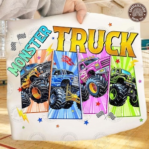 May include: A white pillowcase featuring a colorful graphic of four monster trucks. The text "MONSTER TRUCK" is displayed in bold, outlined letters. Each truck is a different color, with stars and lightning bolts.
