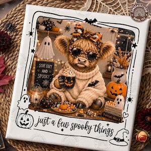 May include: A square print featuring a fluffy Highland cow wearing a patterned bow and heart-shaped sunglasses, dressed in a beige sweater. The scene includes a ghost, a jack-o'-lantern, and a sign reading Stay Cozy and Spooky. Text reads Just a few spooky things.