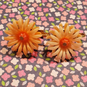 Clip earrings, sunny orange plastic flowers, small image 1