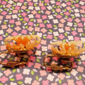 Clip earrings, sunny orange plastic flowers, small image 3