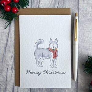 Niedlicher illustrierter Festlicher Husky mit Weihnachtsgeschenk, Siberian Husky Frohe Weihnachten Blankokarte, Entzückendes Festive Hundeliebhaber Kartenpaket