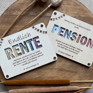 May include: Two wooden cards with a retirement theme. The first card says "Endlich Rente" which translates to "Finally Retirement" in English. The second card says "Herzlichen Gl&uuml;ckwunsch zur Pension" which translates to "Congratulations on your Pension" in English. Both cards have a colorful design with a floral pattern.