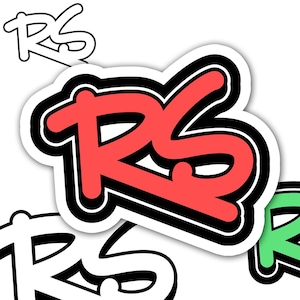 May include: A sticker with the letters "RS" in a graffiti style. The letters are red with a black outline and a white border. There are multiple stickers in the image, with a white background.