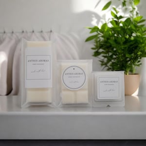 May include: Three wax melts in clear packaging. The wax melts are white and have a label that says "Anthos Aromas Home Fragrance made with love".