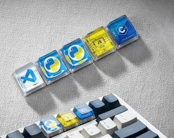 Conjunto de teclas personalizadas para linguagens de programação | Teclas personalizadas em resina epóxi transparente para VS Code, Python, JS e C++, ideais para entusiastas de teclados mecânicos.