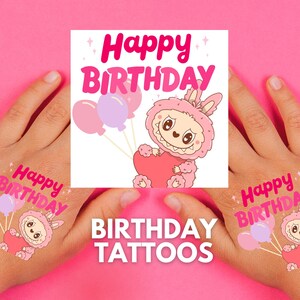 May include: Pink birthday tattoos with the words "Happy Birthday" and a cartoon bunny holding a heart and balloons. The words "Birthday Tattoos" are also displayed. The tattoos are on a pink background.