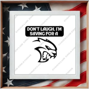 May include: A framed print with a white border, featuring the text "DON'T LAUGH, I'M SAVING FOR A" above a black and white graphic of a snarling animal head. The background shows an American flag.
