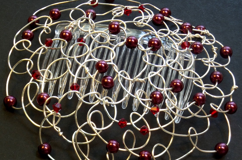 Burgundy pearls and siam swarovski crystal beads are wire wrapped into loops for a women's kippah or yarmulke.