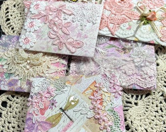 Juego de seis sobres hechos a mano con encaje, perlas y adornos.