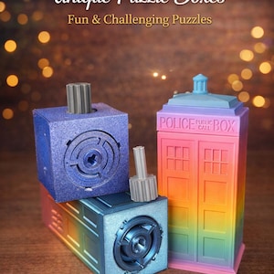 May include: Unique puzzle boxes in the image. One is a blue cube with a maze design, another is a blue box with a speaker design, and the third is a colorful Police Box. The text on the image says "Unique Puzzle Boxes" and "Fun & Challenging Puzzles."