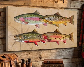 May include: A rectangular canvas print titled 20x10 Trout Canvas featuring four detailed illustrations of trout fish arranged in two rows against a light tan background with a faint compass rose design, displayed on a rustic wooden wall.