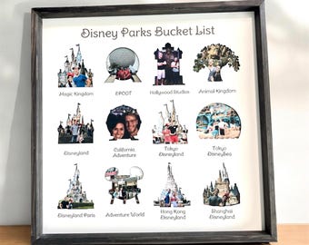 May include: A square framed Disney Parks Bucket List sign featuring twelve distinct icons representing various theme park locations. Each icon contains a small photograph and is labeled with the name of the park, including Magic Kingdom, EPCOT, Hollywood Studios, Animal Kingdom, Disneyland, California Adventure, Tokyo Disneyland, Tokyo DisneySea, Disneyland Paris, Adventure World, Hong Kong Disneyland, and Shanghai Disneyland.