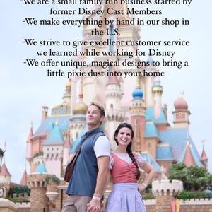 May include: A couple poses in front of a fairytale castle. The text reads "Why buy from us? -We are a small family run business started by former Disney Cast Members -We make everything by hand in our shop in the U.S. -We strive to give excellent customer service we learned while working for Disney -We offer unique, magical designs to bring a little pixie dust into your home Follow us on instagram @trislertrove"