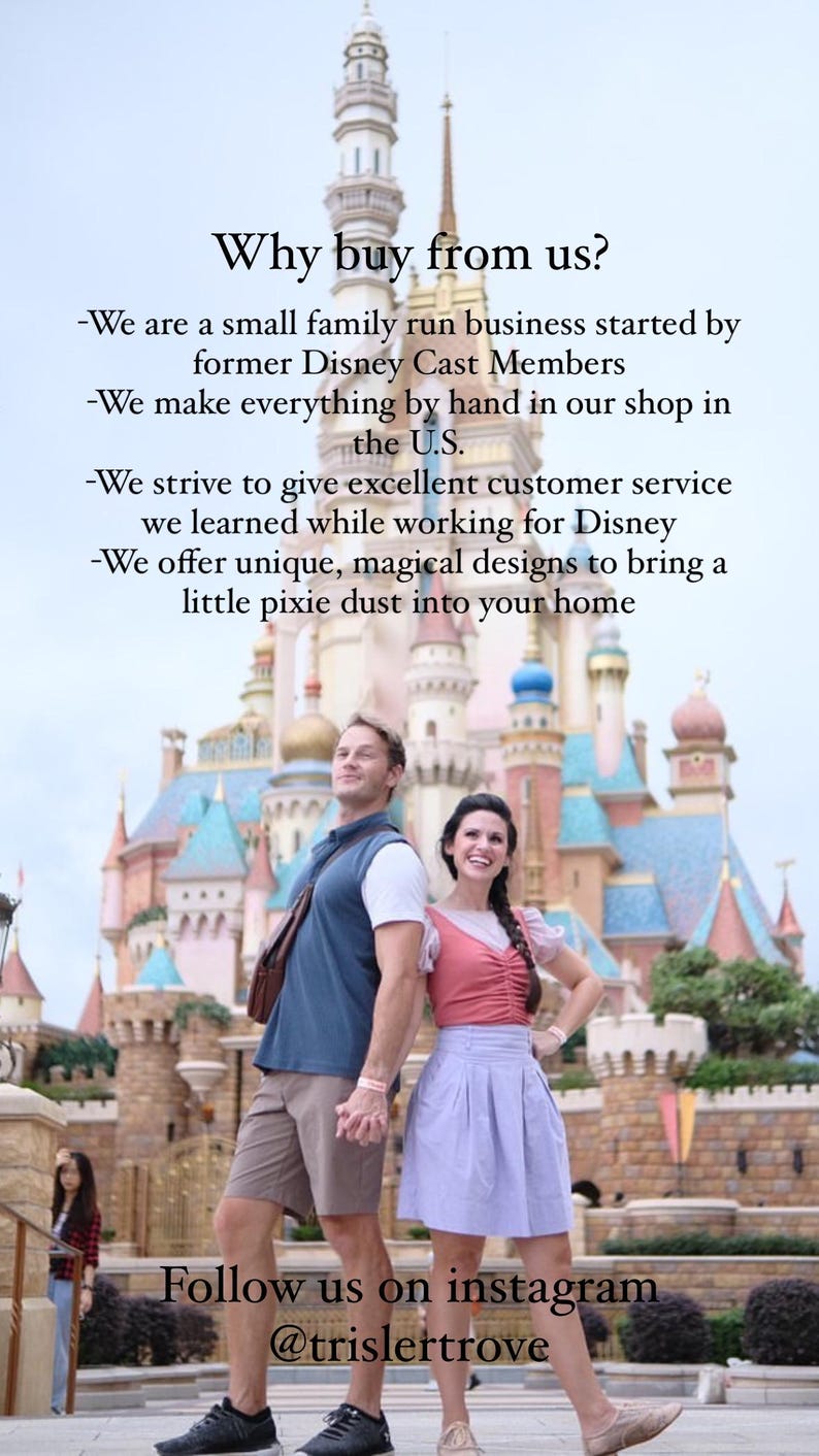 May include: A couple poses in front of a fairytale castle. The text reads "Why buy from us? -We are a small family run business started by former Disney Cast Members -We make everything by hand in our shop in the U.S. -We strive to give excellent customer service we learned while working for Disney -We offer unique, magical designs to bring a little pixie dust into your home Follow us on instagram @trislertrove"