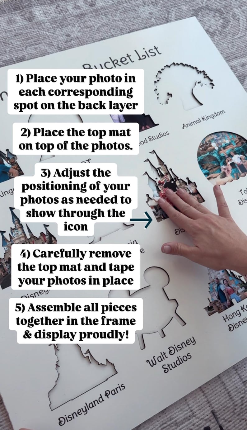 May include: A white wooden board with a list of instructions for creating a Disney-themed bucket list. The instructions include placing photos in corresponding spots on the board, adjusting the positioning of the photos, and assembling all pieces together in a frame. The board features various Disney park icons, including the Magic Kingdom castle, Disneyland Paris, and Walt Disney Studios.