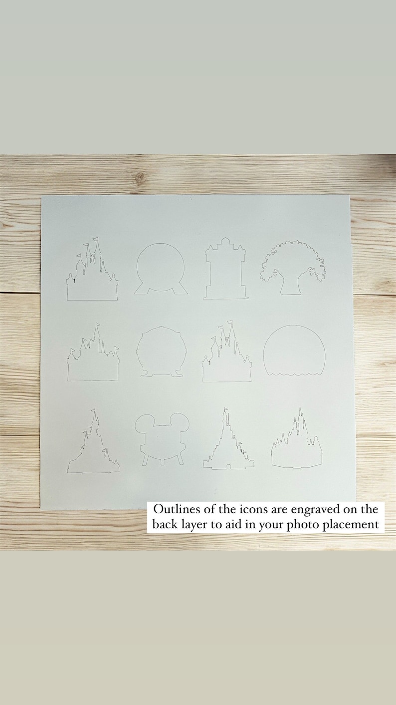 May include: A white sheet of paper with outlines of various Disney icons, including Cinderella's Castle, the Spaceship Earth, and Mickey Mouse's head. The outlines are engraved on the back layer to aid in photo placement.