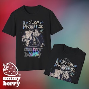 May include: Black t-shirts with a graphic design featuring two figures and the text "Hexcore Nights" in a stylized font. The design includes a colorful, abstract background. The shirts are from Emmy Berry.