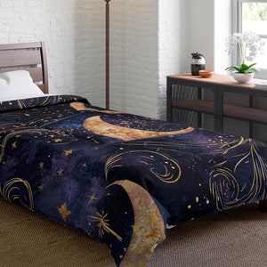 May include: A navy blue twin-sized duvet cover with a gold crescent moon and stars pattern. The duvet cover is on a bed with a brown wooden headboard and a brown rug.