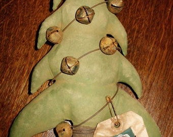 May include: A green felt Christmas tree with a star on top and bells hanging from it. The tree is decorated with a brown felt trunk and a tag that says "Good Old St. Nick's Grubby Christmas Tree" and "Prim and Proper Creations 2005".