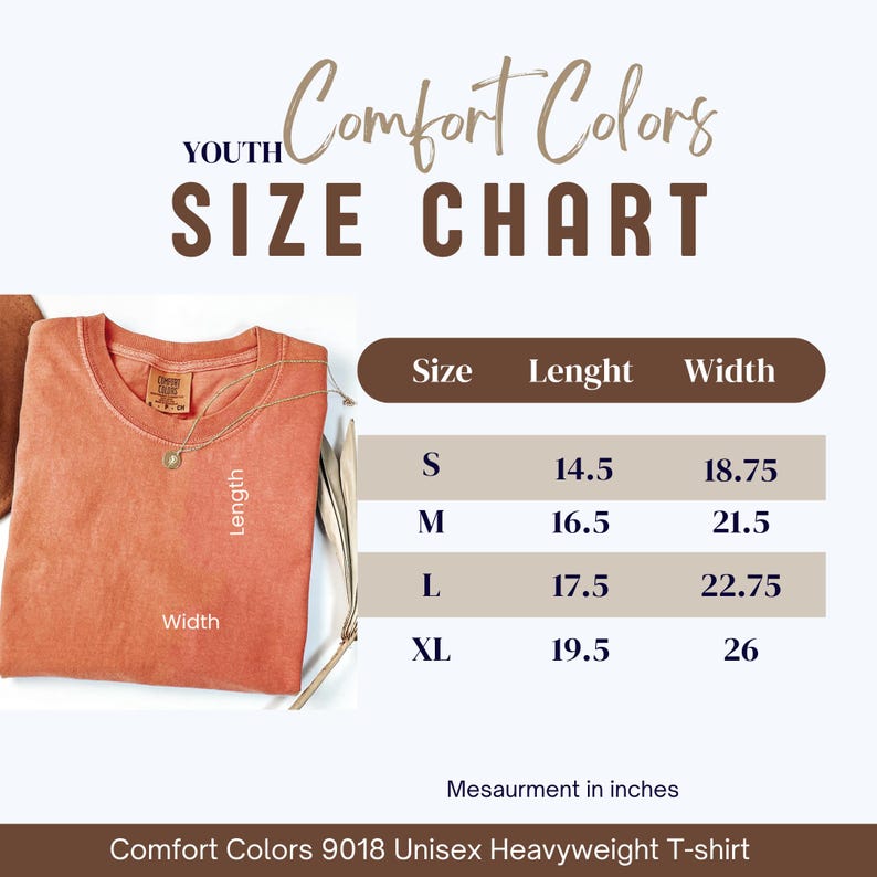 May include: A coral Comfort Colors 9018 Unisex Heavyweight T-shirt with a size chart. The chart shows measurements in inches for sizes S, M, L, and XL. The shirt has a crew neck and a tag.