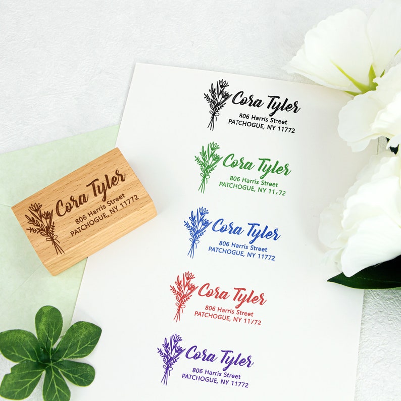 May include: Five different versions of a return address stamp with a floral design. The stamp reads "Cora Tyler" with the address "806 Harris Street, PATCHOGUE, NY 11772". The stamps are printed in green, blue, red, purple, and brown ink.