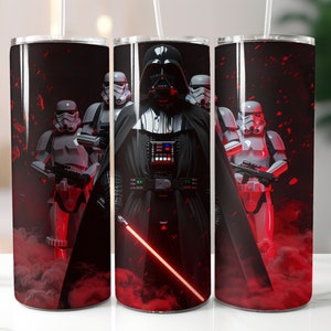 May include: A black and white image of Darth Vader and Stormtroopers on a red and black background. The image is printed on a stainless steel tumbler.