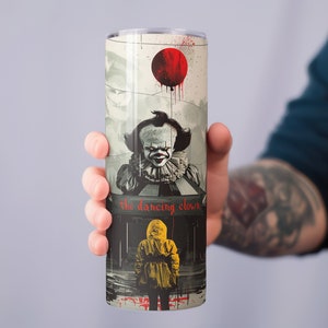 May include: A stainless steel tumbler with a graphic of a clown holding a red balloon. The text "the dancing clown" is printed on the tumbler.