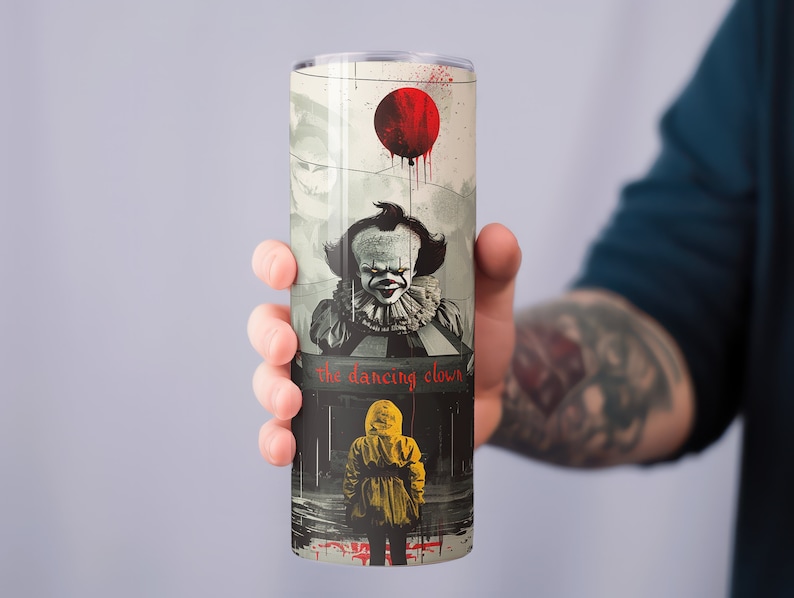 May include: A stainless steel tumbler with a graphic of a clown holding a red balloon. The text "the dancing clown" is printed on the tumbler.