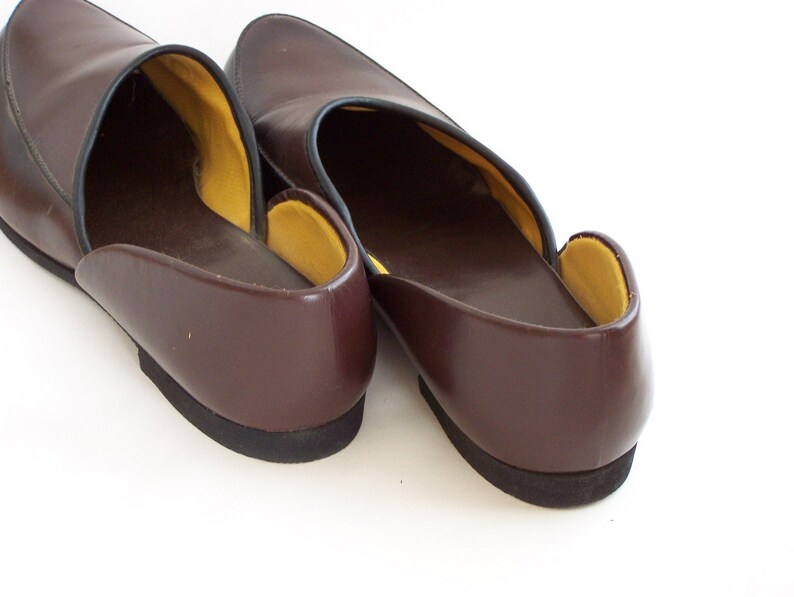 brown and white slippers