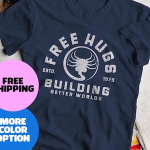 エイリアン映画フェイスハガーユニセックスTシャツ、フリーハグパロディTシャツ、SFホラー、ウェイランド・ユタニ、レトロ80年代シャツ、ゼノモーフグッズ、宇宙