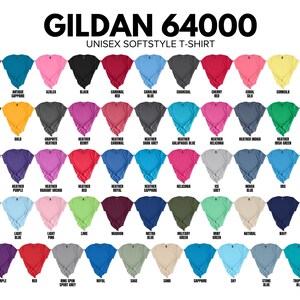 May include: A display of Gildan 64000 Unisex Softstyle T-shirts in various colors. The image showcases a wide array of hues, including shades of red, blue, green, and neutral tones. The text "GILDAN 64000" and "UNISEX SOFTSTYLE T-SHIRT" are visible at the top.