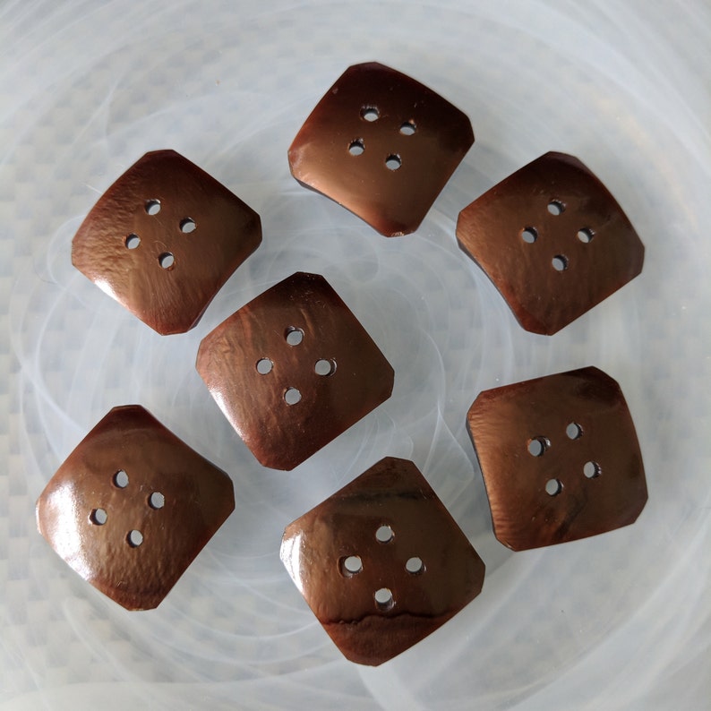 Seven Brown Square Plastic Buttons