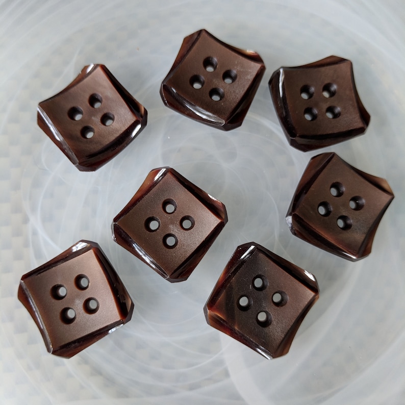 Seven Brown Square Plastic Buttons