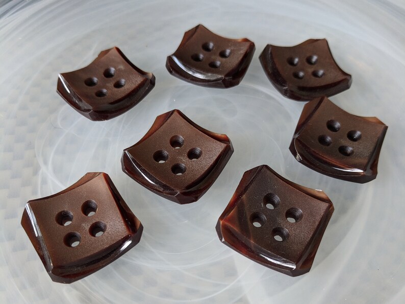 Seven Brown Square Plastic Buttons