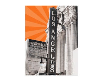 May include: A black and white image of a vintage "LOS ANGELES" sign, with an orange burst background. The sign is vertical and illuminated, with a classic font. The image captures a historic building facade with architectural details.