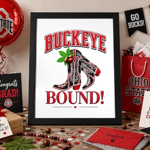 May include: A framed print featuring the text "BUCKEYE BOUND!" and a pair of black and red cowboy boots. The image is surrounded by graduation decorations, including a balloon, gift, and cards. The Ohio State University logo is visible.