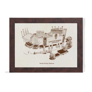 May include: A framed print featuring a sepia-toned sketch of Carter-Finley Stadium. The artwork showcases the stadium's architecture, including the stands, exterior, and surrounding elements. The frame is a dark brown color, and the stadium's name is printed at the bottom.