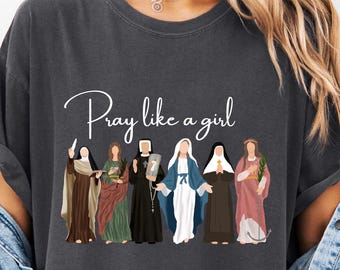 Comfort Colors Catholic Saint T-Shirt, Pray Like A Girl Christian Shirt,  Gift for Women, Faith Inspired Shirt, Cute Faith Sweatshirt