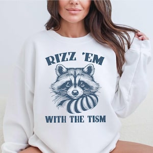 Rizz&#39;em With The Tism Sweatshirt, Autism Awareness Sweater, Funny Mental Health Hoofie, Funnny Autism Shirt, Cute Raccoon, Autistic Raccoon