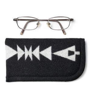 May include: A rustic wooden sign with the text "Welcome to our home" in white lettering. The sign features a distressed finish and a simple, inviting design, perfect for front door decor.