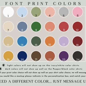 May include: A color chart with 24 circular color swatches, numbered 1-24, arranged in rows. The chart includes a variety of colors, from white and light blue to dark green and black. Text at the bottom advises on color choices for shirts.