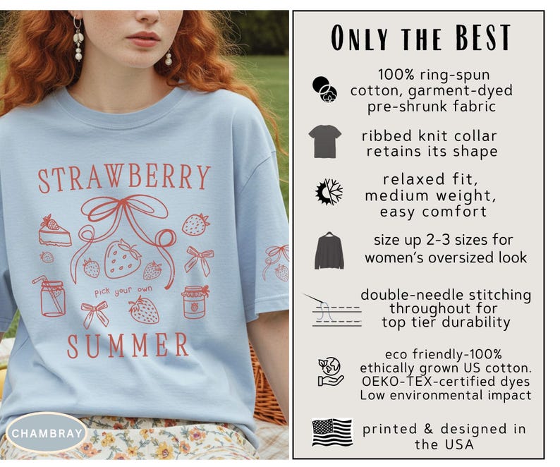 May include: Light blue t-shirt with a strawberry and summer graphic. The shirt features the text "STRAWBERRY SUMMER" in red, along with strawberry illustrations. Made with eco-friendly US cotton and designed in the USA.