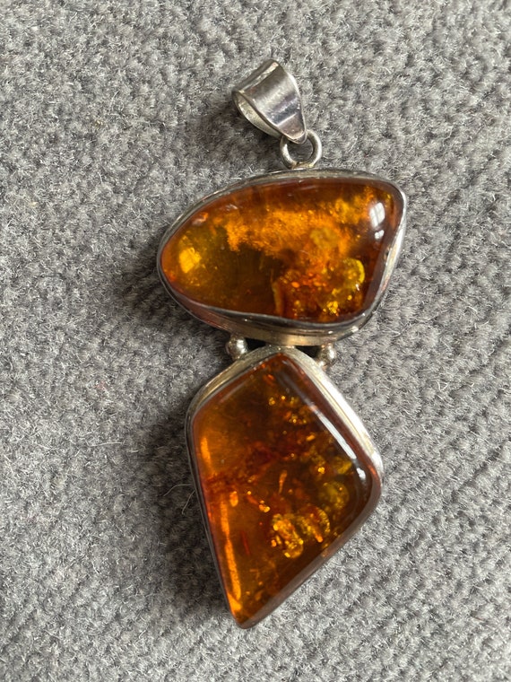 Amber and Silver pendant.