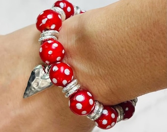 Hammered Silver Colored Heart Bracelet with Red Venetian Skunk Beads