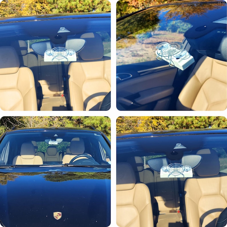 Puede incluir: Un Porsche Cayenne negro con un espejo retrovisor montado en el parabrisas. El espejo tiene un dise&ntilde;o circular y est&aacute; hecho de pl&aacute;stico transparente.